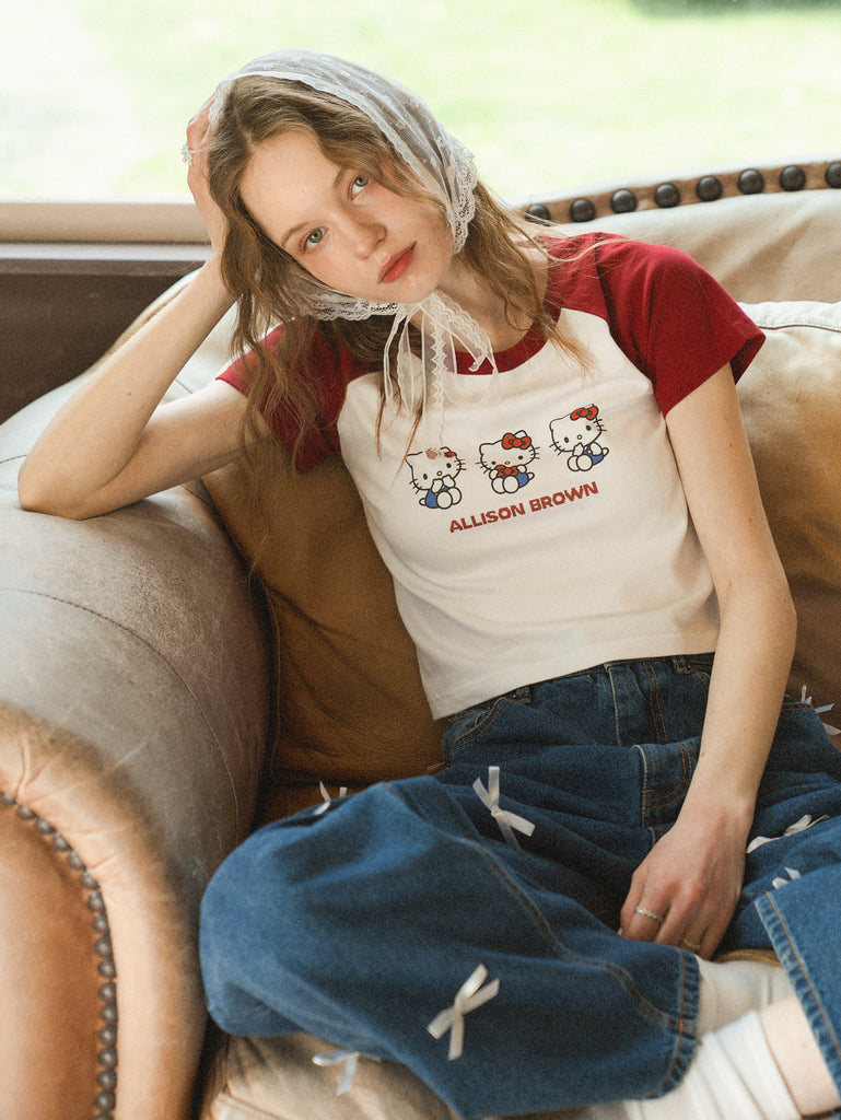 上品なブランド × KITTY HELLO ALLISON T-SHIRT LOGO BROWN トップス